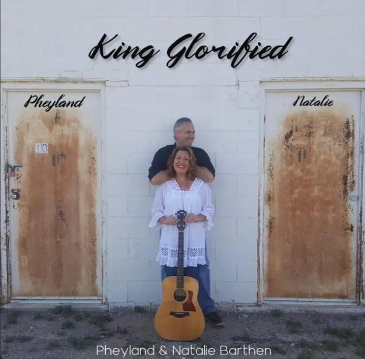 Pheyland and Natalie Barthen with acoustic guitar